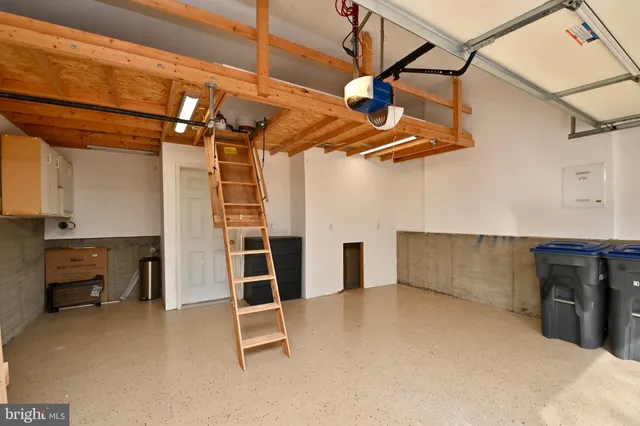 a view of a swimming pool with an outdoor space and seating area