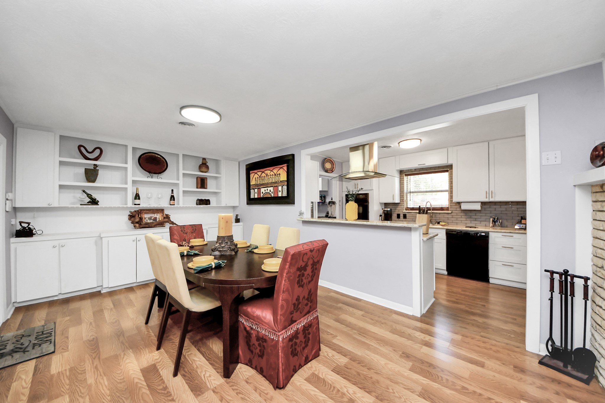 142 Wall Street Cleveland, TX 77327 - Photo 14 of 36 a view of kitchen with cabinets and wooden floor