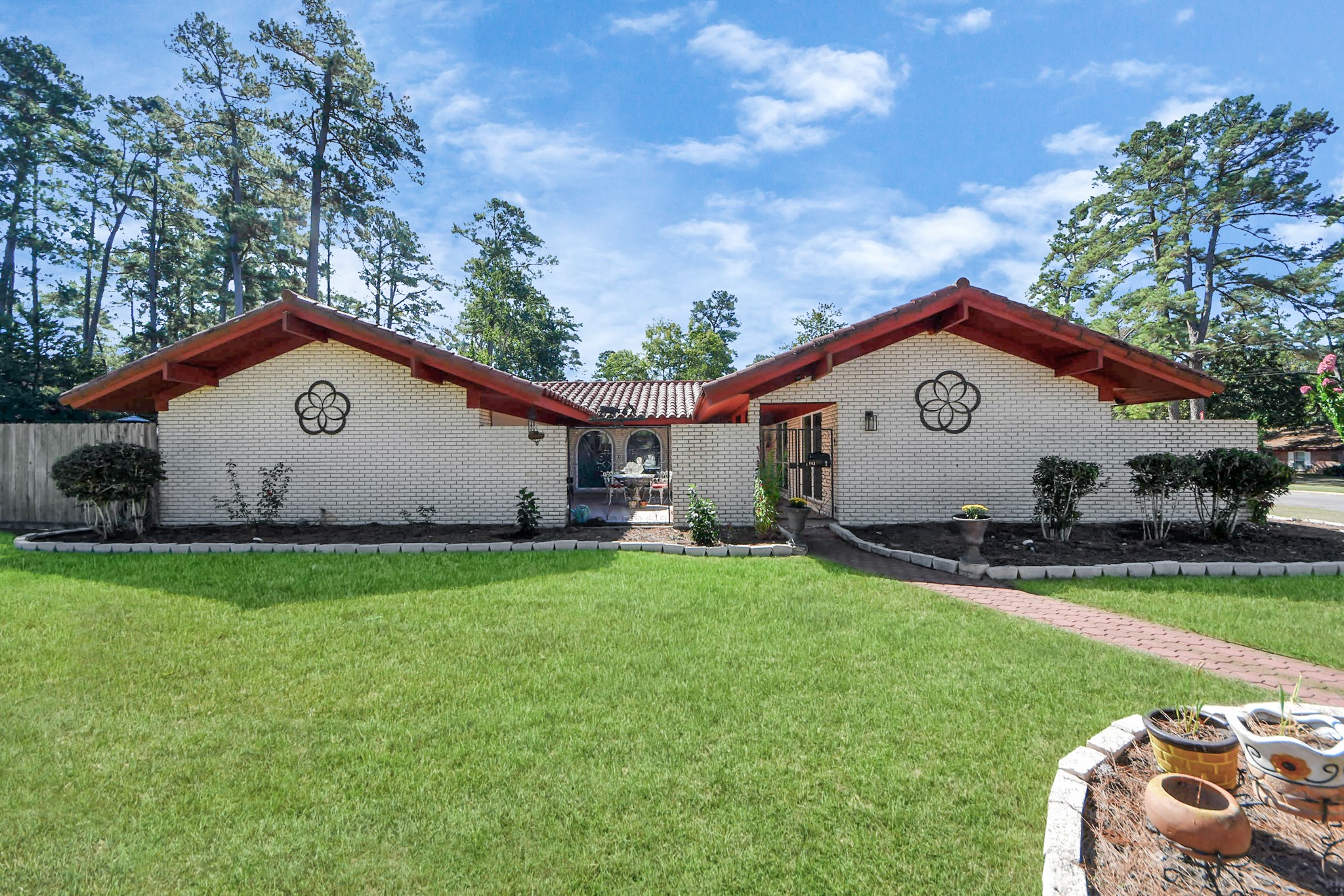 142 Wall Street Cleveland, TX 77327 - Photo 3 of 36 a view of a house with backyard