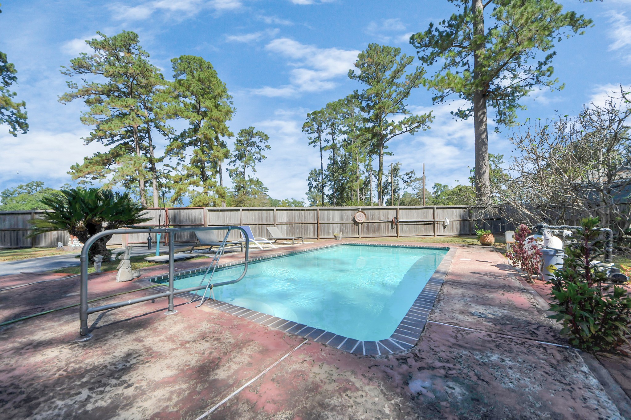 142 Wall Street Cleveland, TX 77327 - Photo 35 of 36 a view of a backyard