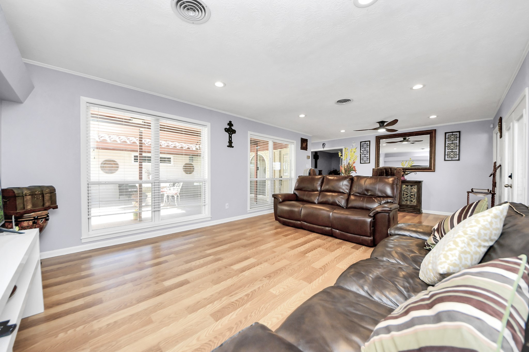 142 Wall Street Cleveland, TX 77327 - Photo 6 of 36 Living Room with the front patio right outside the new windows