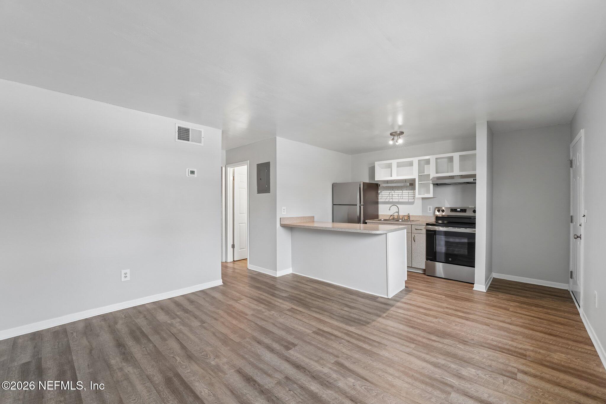 1845 Old Moultrie Road, Unit 24 St. Augustine, FL 32084 - Photo 6 of 11 Open to Kitchen