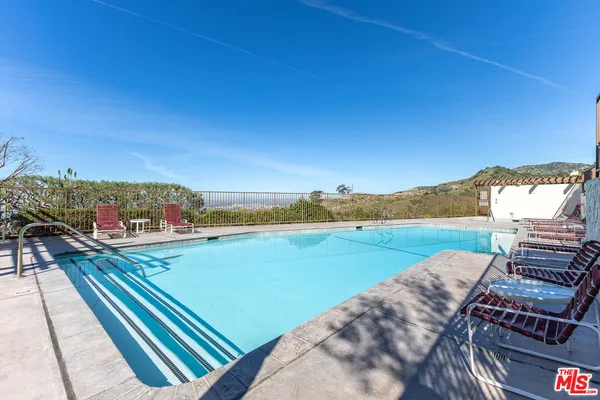 a view of a lake with a city