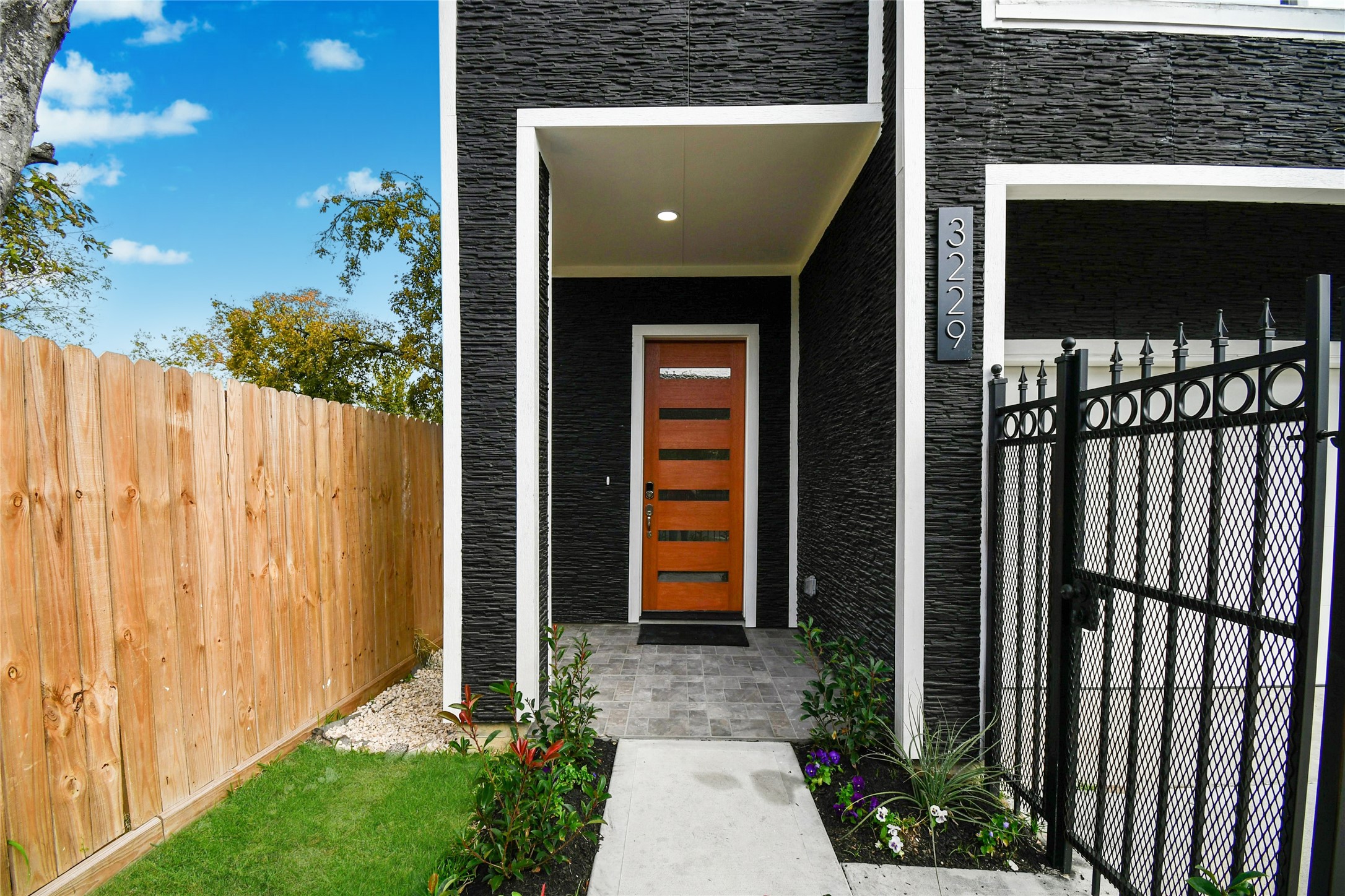 3229 Tuam Street Houston, TX 77004 - Photo 5 of 50 Entrance, beautiful mahogany wood door and patio tiles