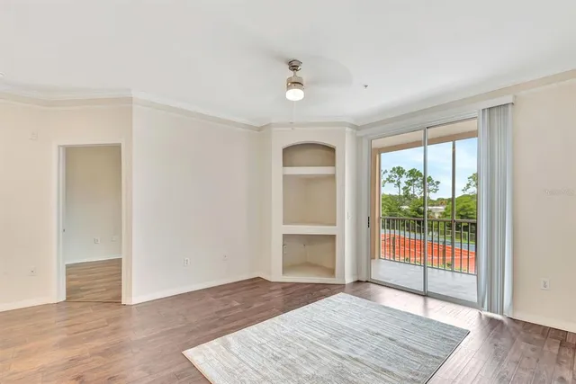 a kitchen with granite countertop a sink and a window