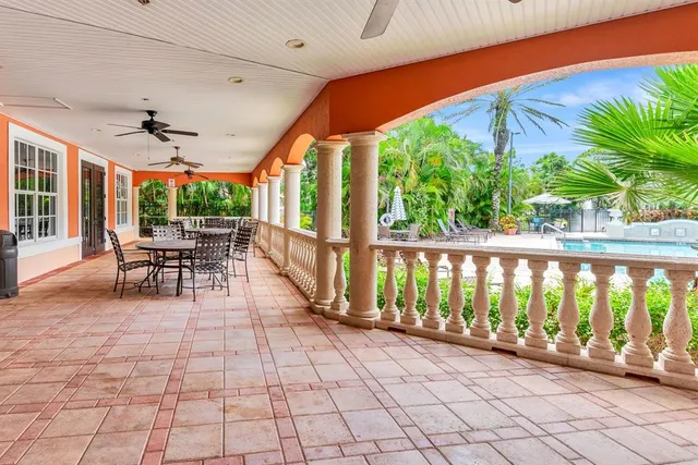 a dining room with furniture window and wooden floor