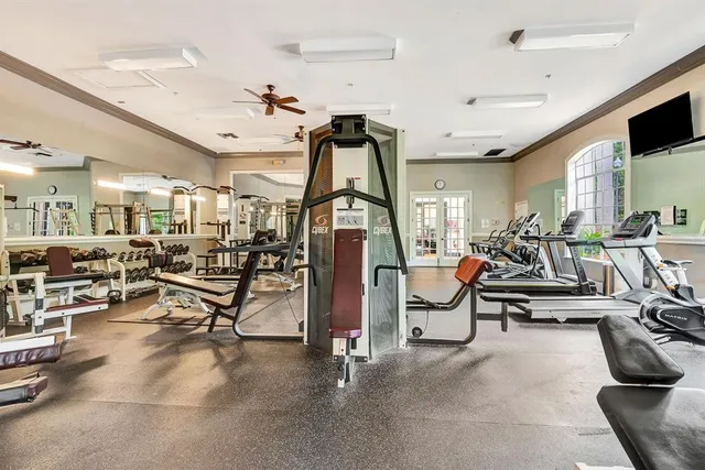 a view of a livingroom with furniture and a kitchen