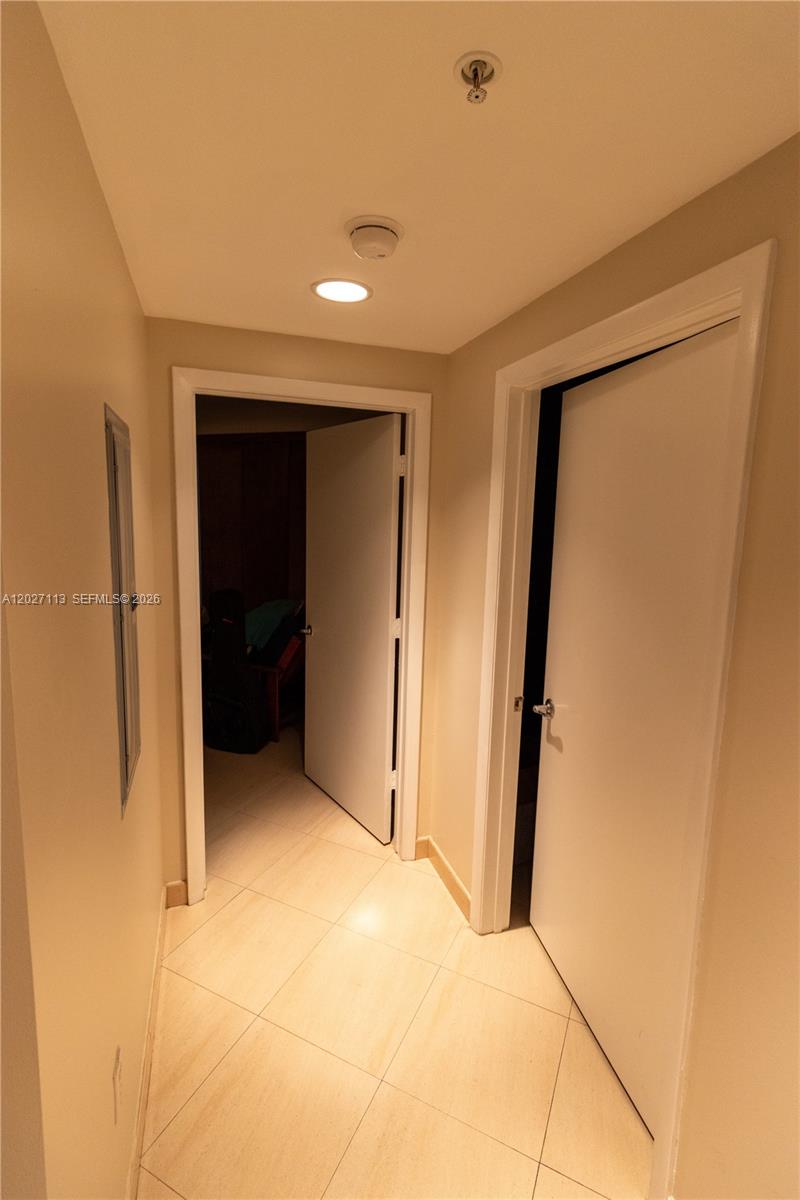 7275 Southwest 90th Way, Unit 213 Miami, FL 33156 - Photo 22 of 31 a view of entryway with wooden floor