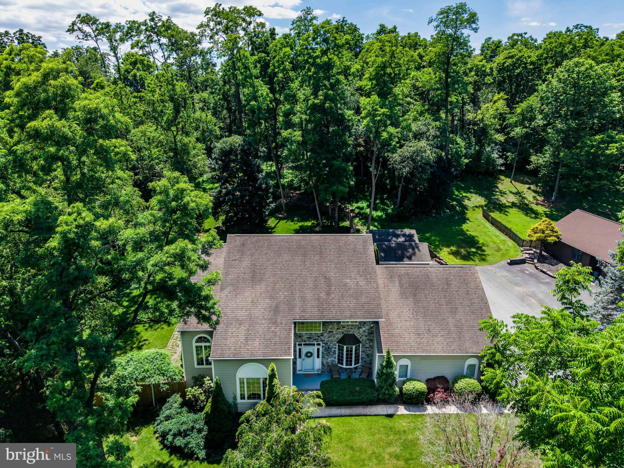 176 Richland Road Carlisle, PA 17015 - Photo 2 of 59 an aerial view of a house with yard and outdoor seating