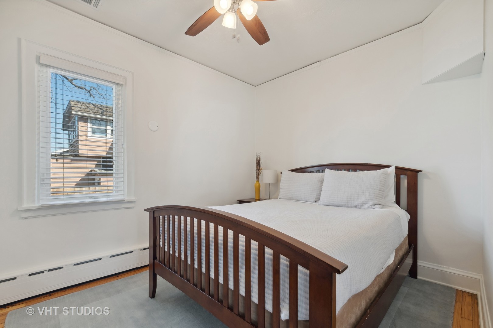 116 High Street Highwood, IL 60040 - Photo 9 of 18 a bedroom with a bed and a window