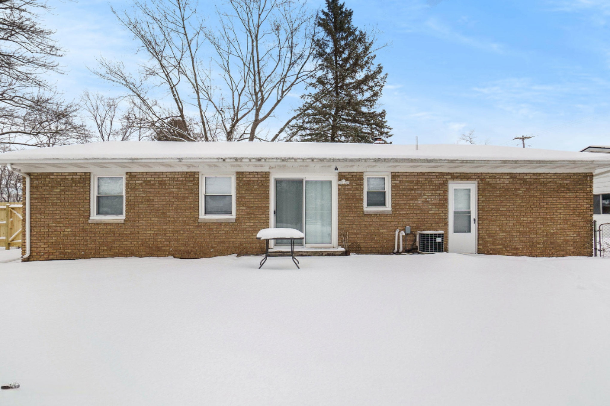 105 Sundown Street Springfield, MI 49037 - Photo 2 of 22 105 Sundown St Springfield MI 49037 rear