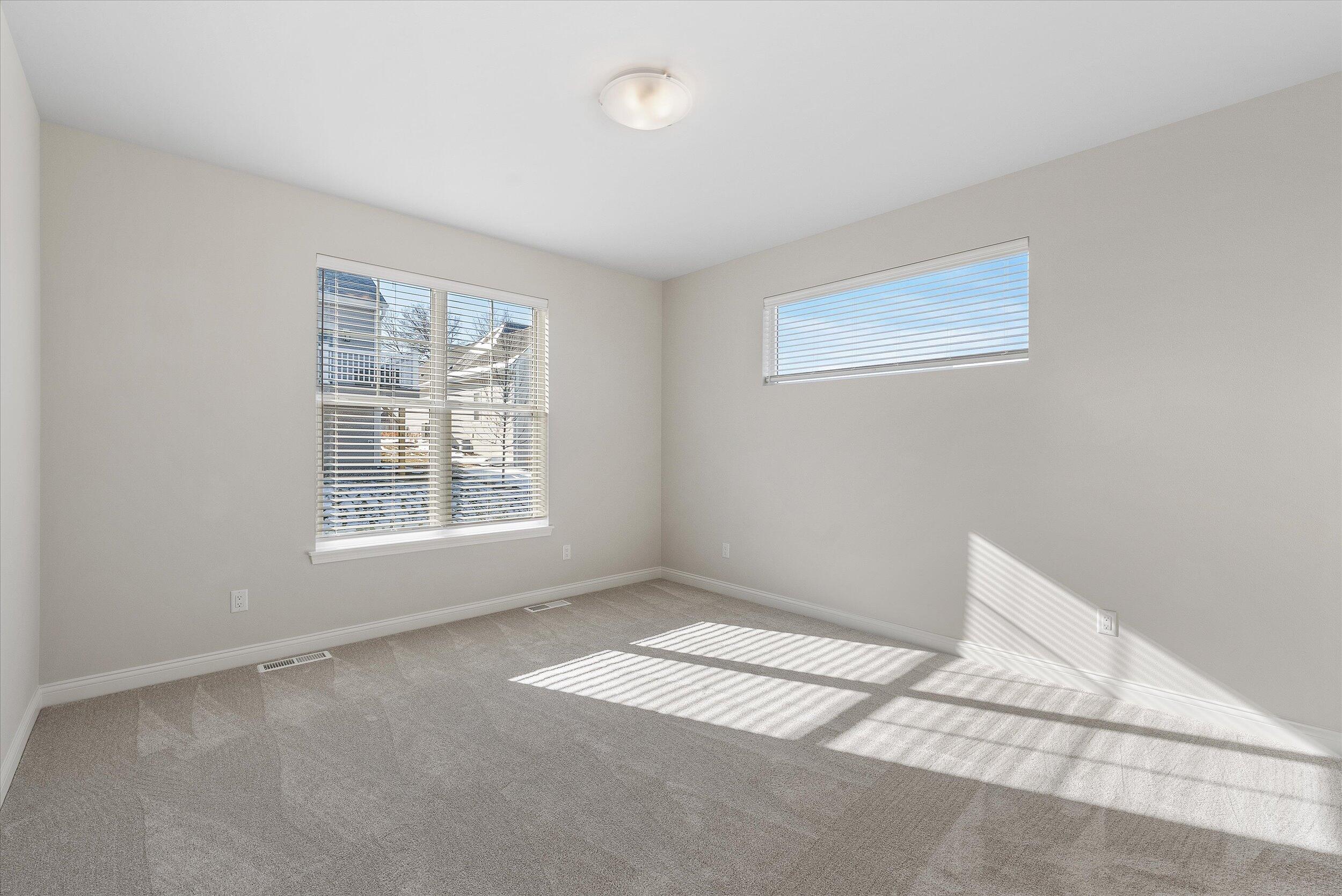 394 Sandy Circle Pewaukee, WI 53072 - Photo 20 of 36 Primary Bedroom