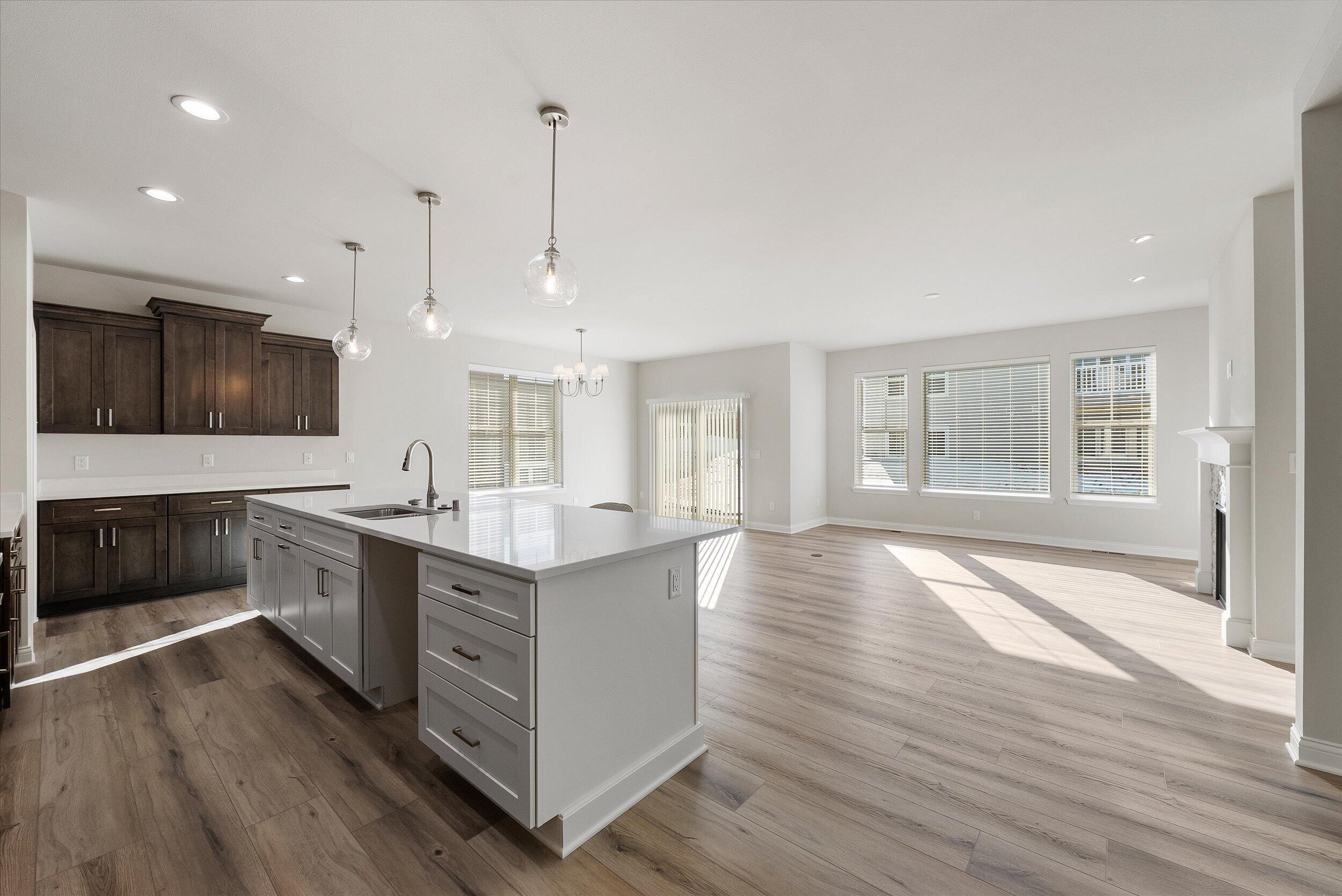 394 Sandy Circle Pewaukee, WI 53072 - Photo 2 of 31 Open Kitchen & Living