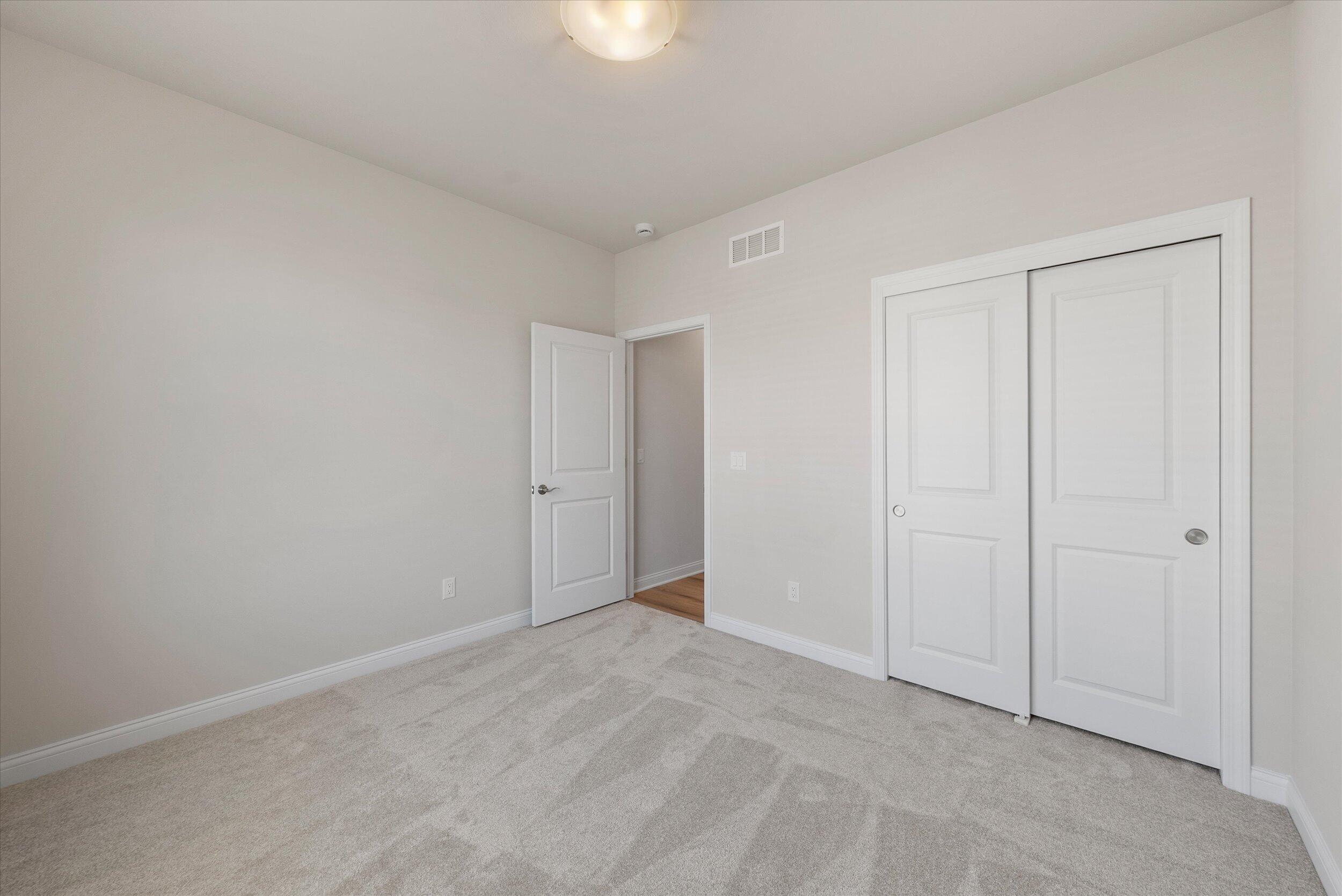 394 Sandy Circle Pewaukee, WI 53072 - Photo 26 of 36 Bedroom 2