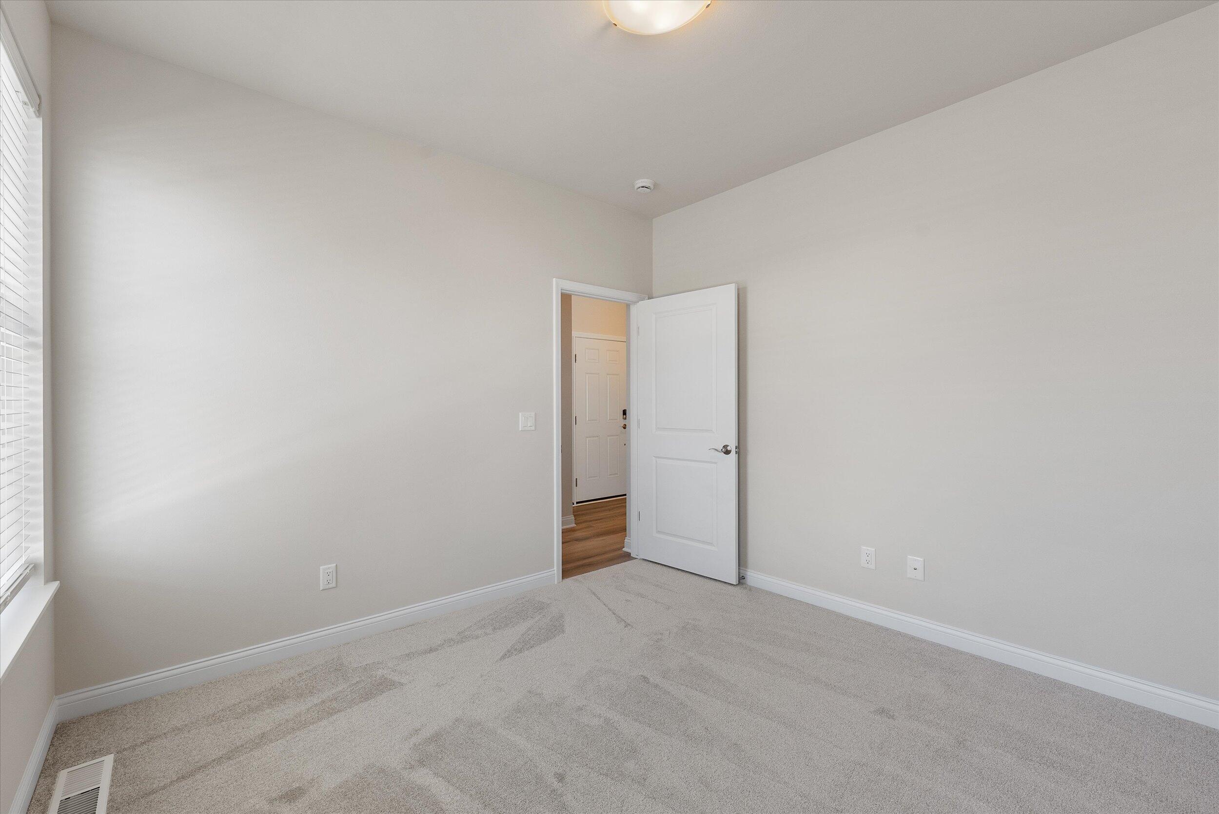 394 Sandy Circle Pewaukee, WI 53072 - Photo 28 of 36 Bedroom 3