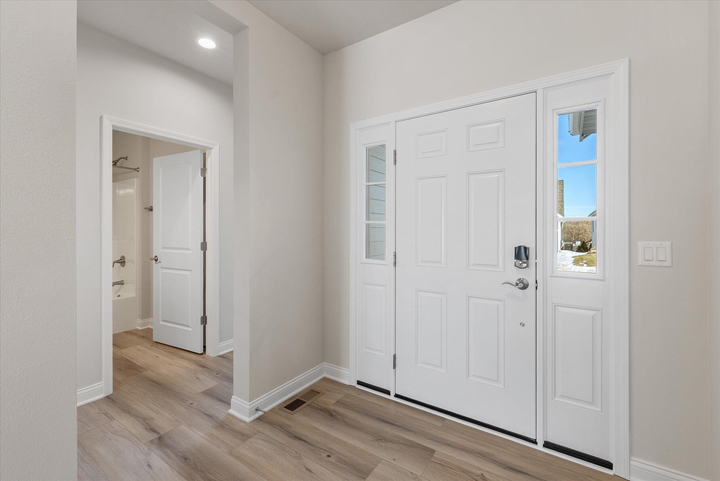 394 Sandy Circle Pewaukee, WI 53072 - Photo 30 of 36 Front Entrance