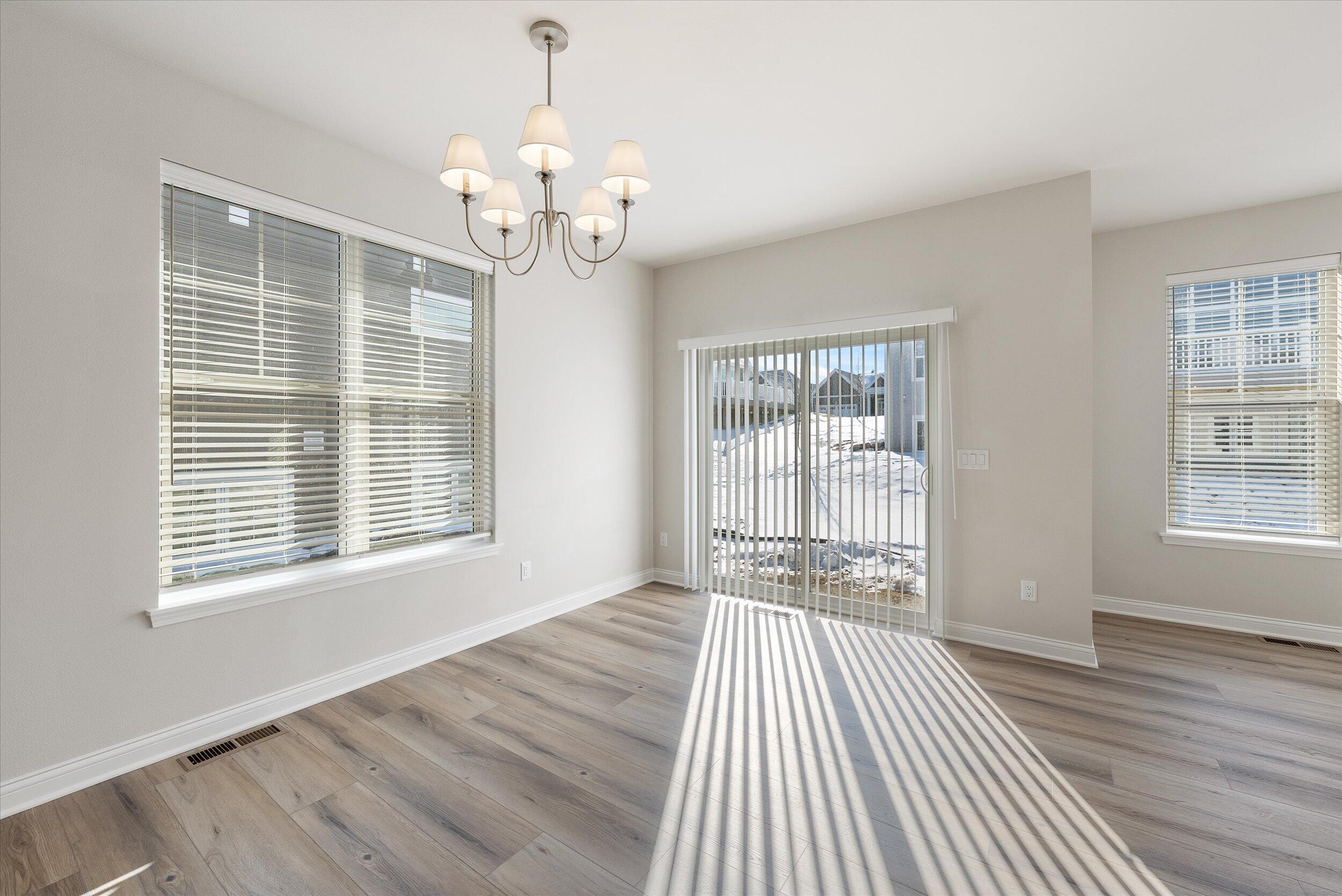 394 Sandy Circle Pewaukee, WI 53072 - Photo 8 of 31 Dining Area w/Patio Door