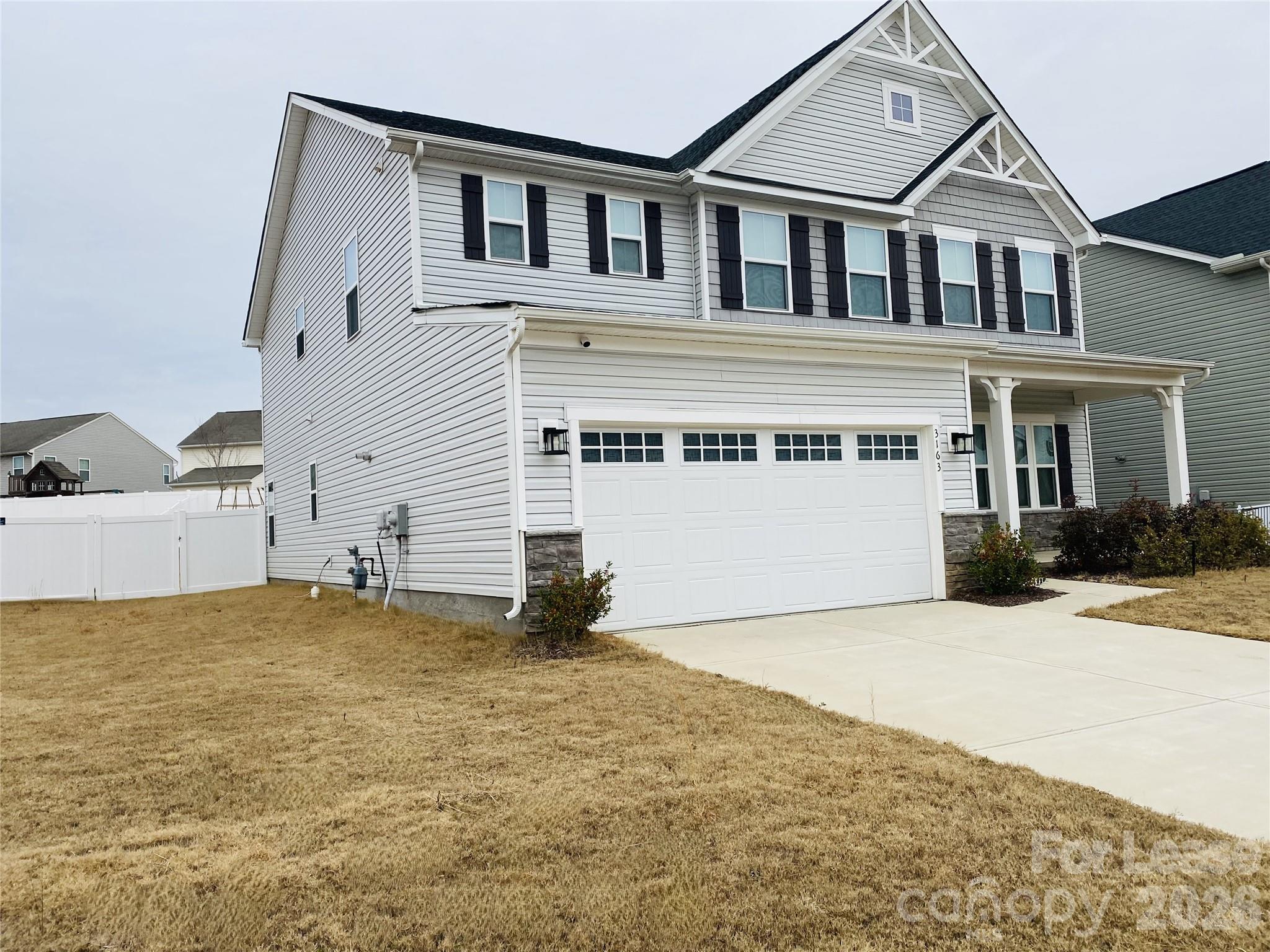 3163 Streamside Drive Davidson, NC 28036 - Photo 2 of 20 a view of a house with a yard