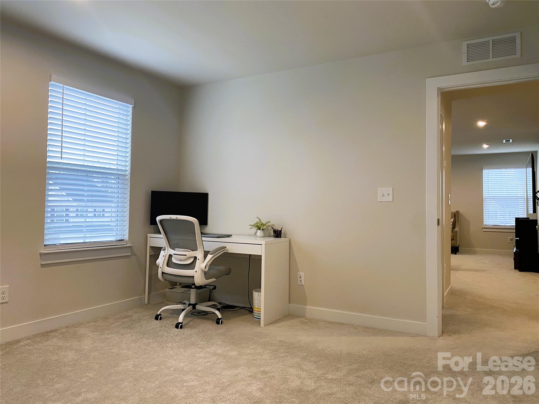 3163 Streamside Drive Davidson, NC 28036 - Photo 8 of 20 a view of a workspace with a window