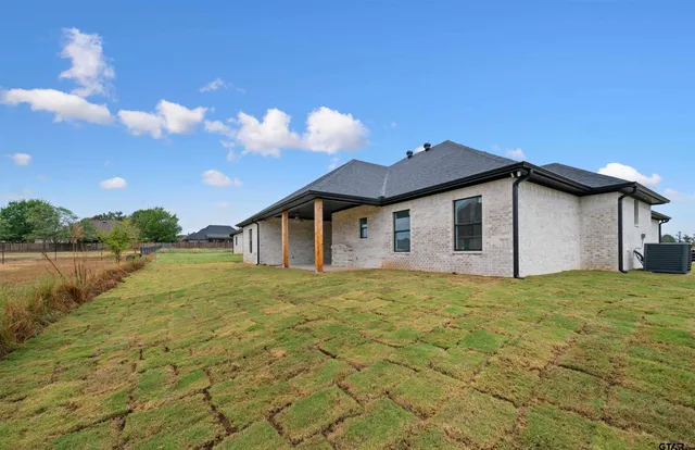 a view of outdoor space with a patio