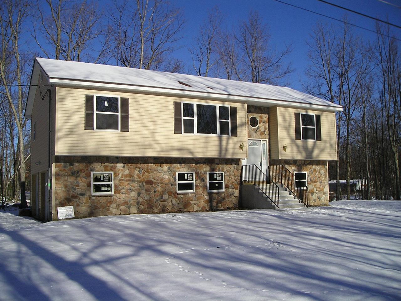 34-40 Granite Road Levittown, PA 19057 - Photo 1 of 1 a front view of a house with a yard