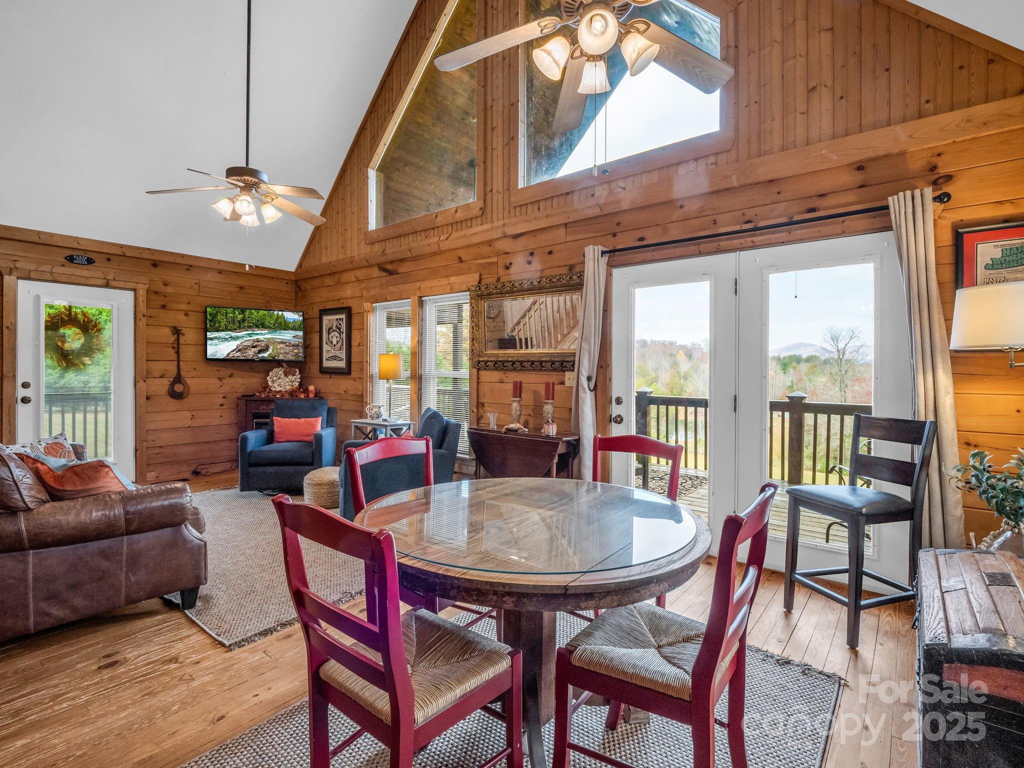 557 Emerald Parkway Rutherfordton, NC 28139 - Photo 13 of 48 a view of a dining room with furniture window and outside view