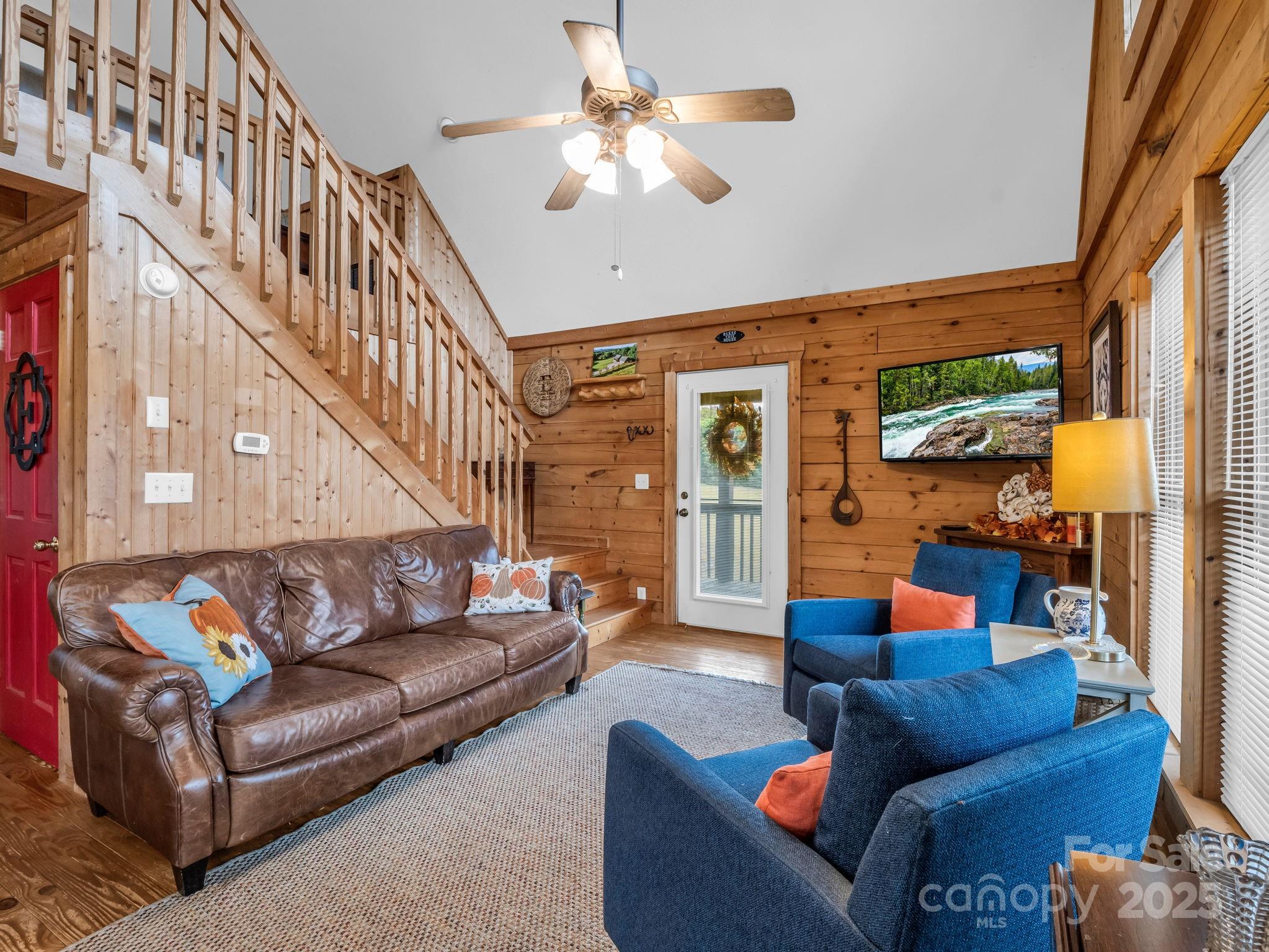 557 Emerald Parkway Rutherfordton, NC 28139 - Photo 22 of 48 a living room with furniture and a large window