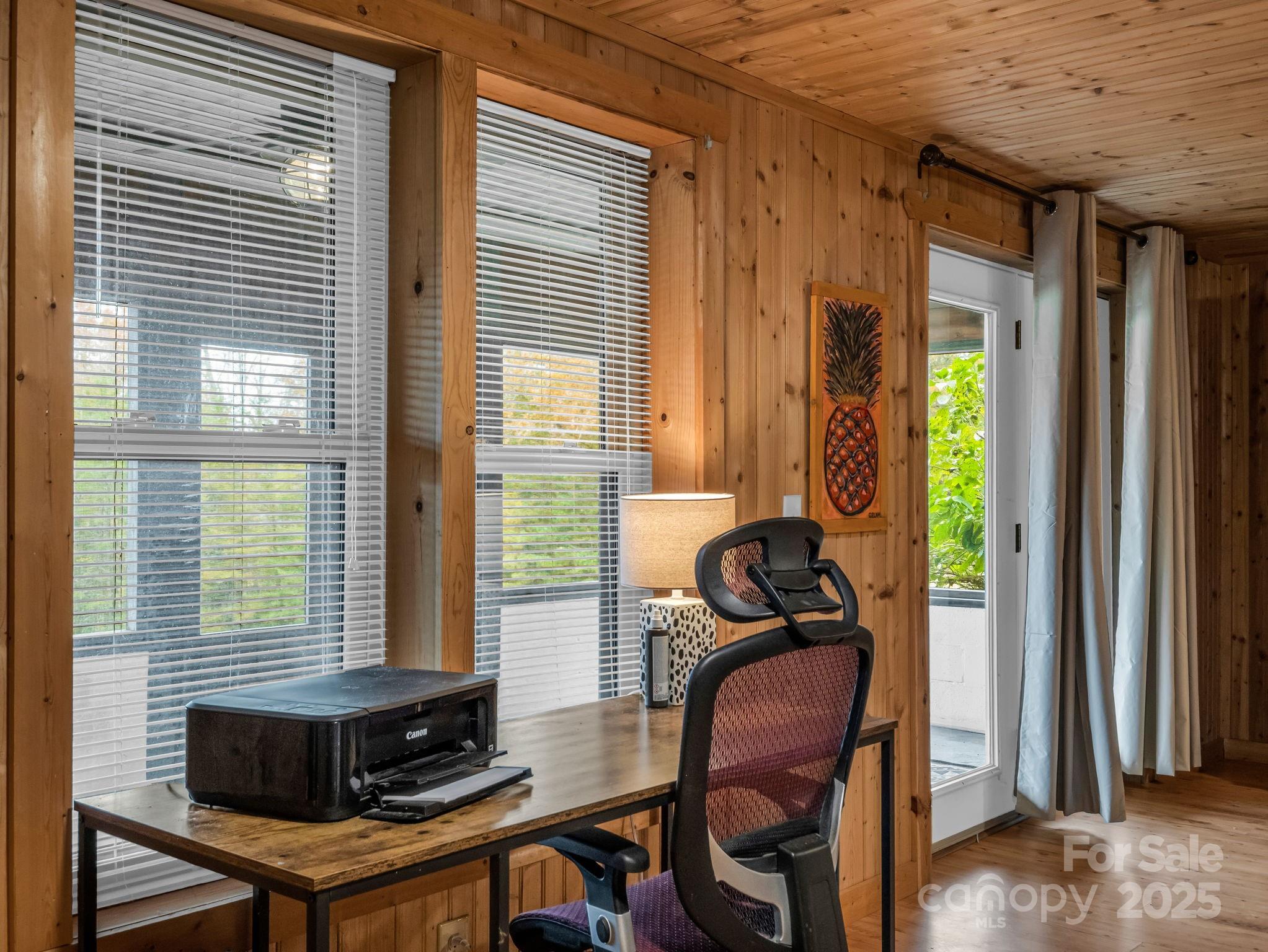 557 Emerald Parkway Rutherfordton, NC 28139 - Photo 26 of 48 a view of a workspace with furniture and a window