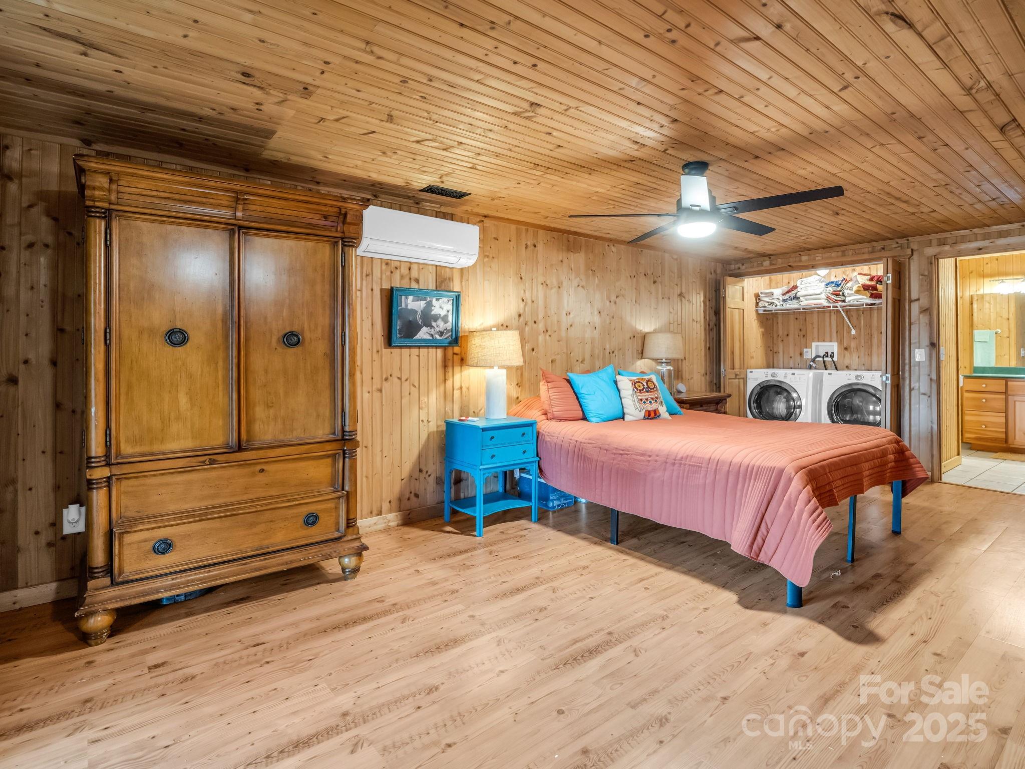 557 Emerald Parkway Rutherfordton, NC 28139 - Photo 29 of 48 a bedroom with a bed and a mirror