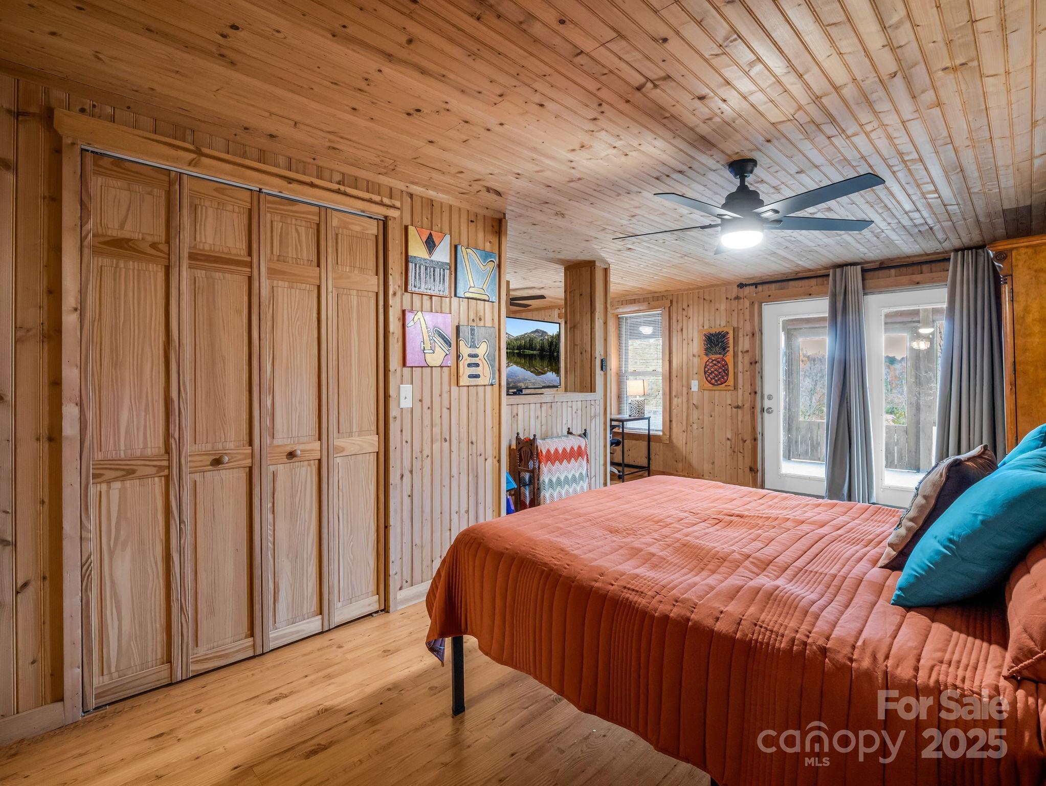 557 Emerald Parkway Rutherfordton, NC 28139 - Photo 34 of 48 a bed sitting in a spacious bedroom next to a window