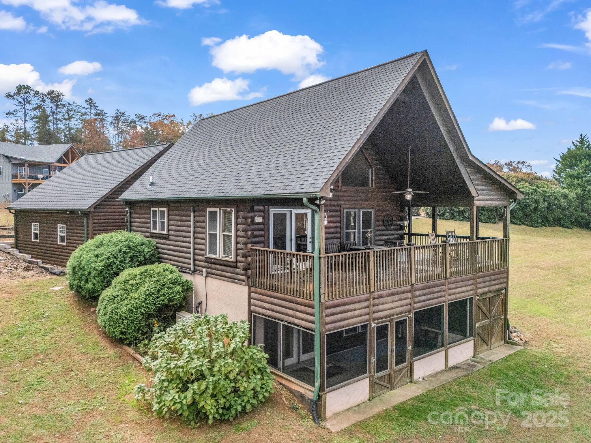 557 Emerald Parkway Rutherfordton, NC 28139 - Photo 38 of 48 a front view of a house with a yard