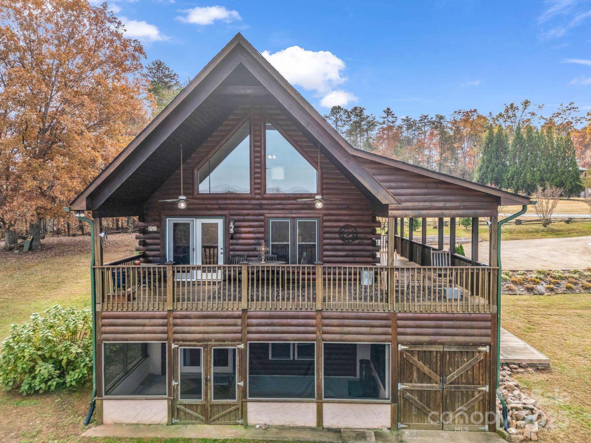 557 Emerald Parkway Rutherfordton, NC 28139 - Photo 39 of 48 a front view of a house with a balcony