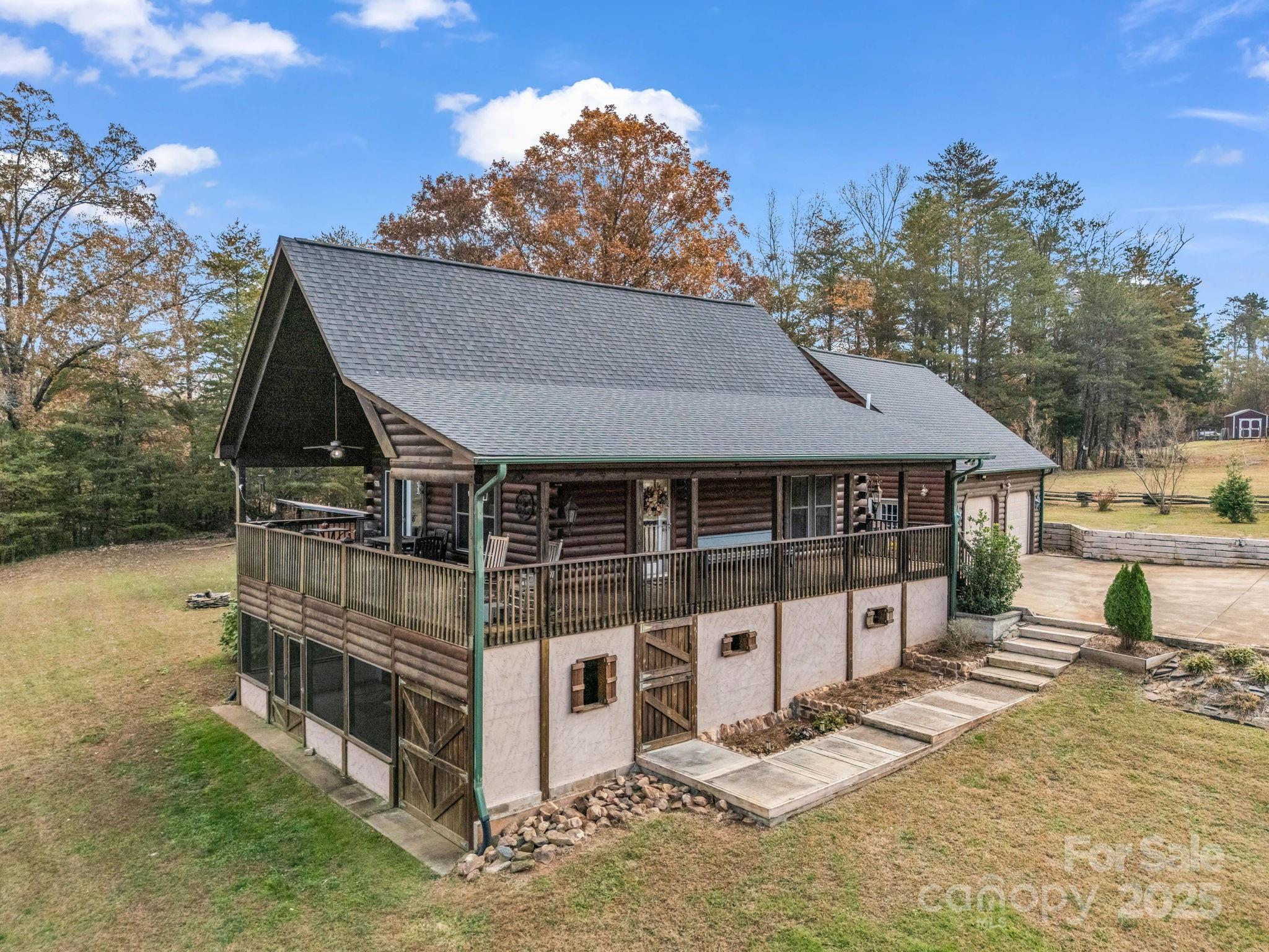 557 Emerald Parkway Rutherfordton, NC 28139 - Photo 40 of 48 a view of a house with a yard