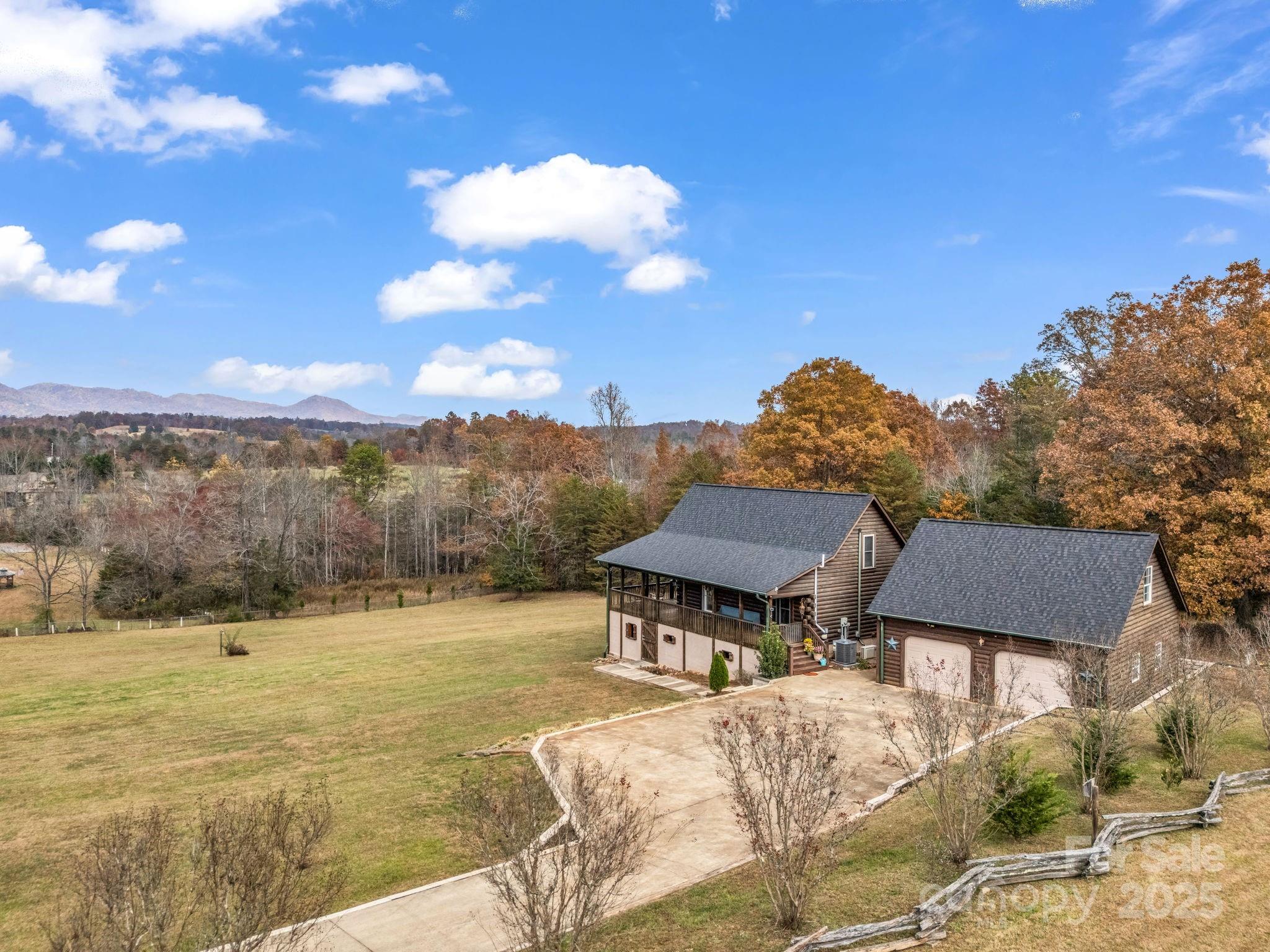 557 Emerald Parkway Rutherfordton, NC 28139 - Photo 5 of 48 a view of a big house with a big yard
