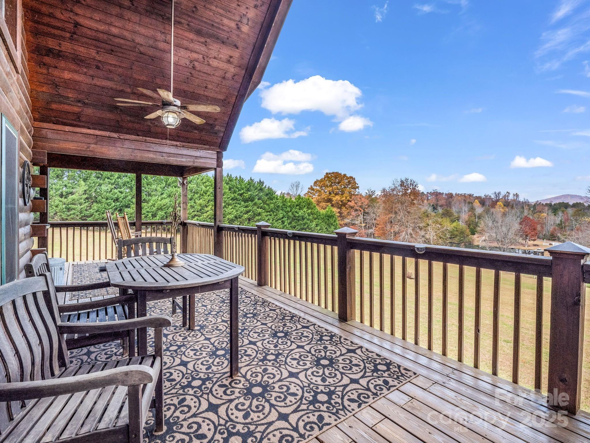 557 Emerald Parkway Rutherfordton, NC 28139 - Photo 6 of 48 a view of a balcony with furniture