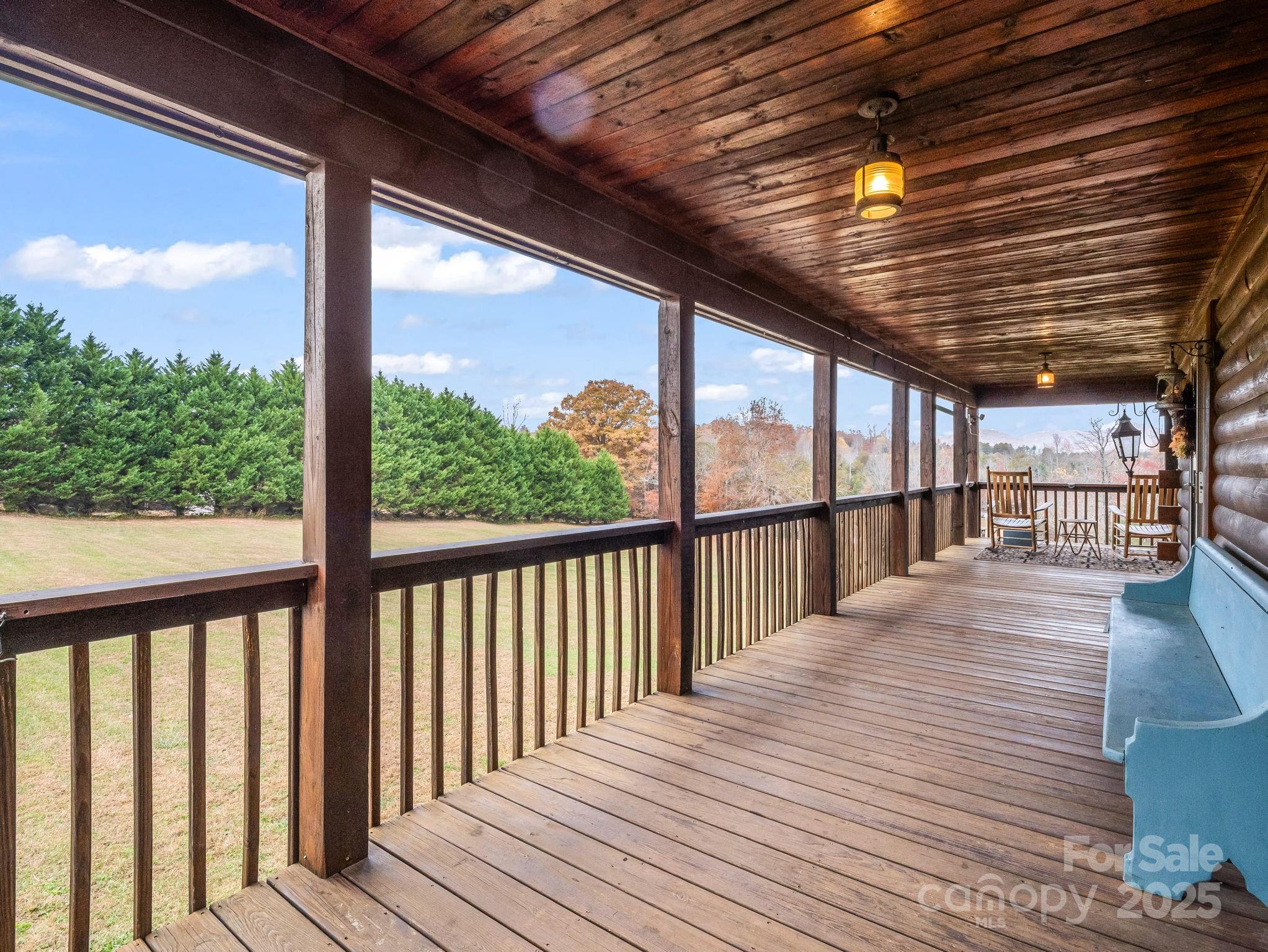 557 Emerald Parkway Rutherfordton, NC 28139 - Photo 9 of 48 a view of a balcony with wooden floor