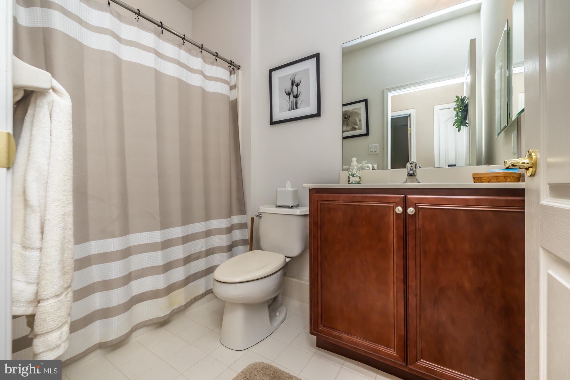 1105 Hulnick Road, Unit 43877 Coatesville, PA 19320 - Photo 19 of 38 First floor full bathroom with a tub