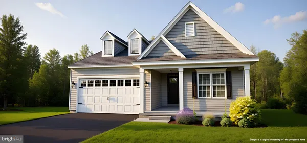 a front view of a house with a yard and porch