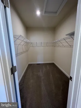 view of empty room with wooden floor