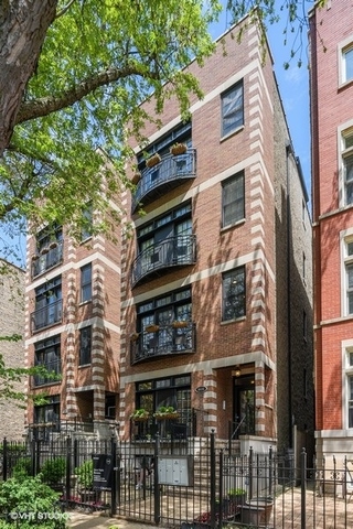 a front view of a multi story residential apartment building