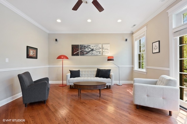 3535 North Reta Avenue, Unit 2 Chicago, IL 60657 - Photo 3 of 12 a living room with furniture and a wooden floor