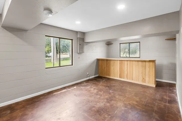 an empty room with windows