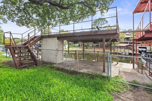 a view of a backyard with a patio