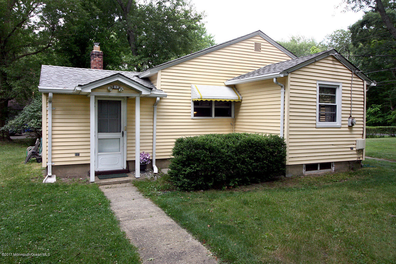 464 Georgia Tavern Road Howell, NJ 07731 - Photo 12 of 17 a front view of a house with a yard