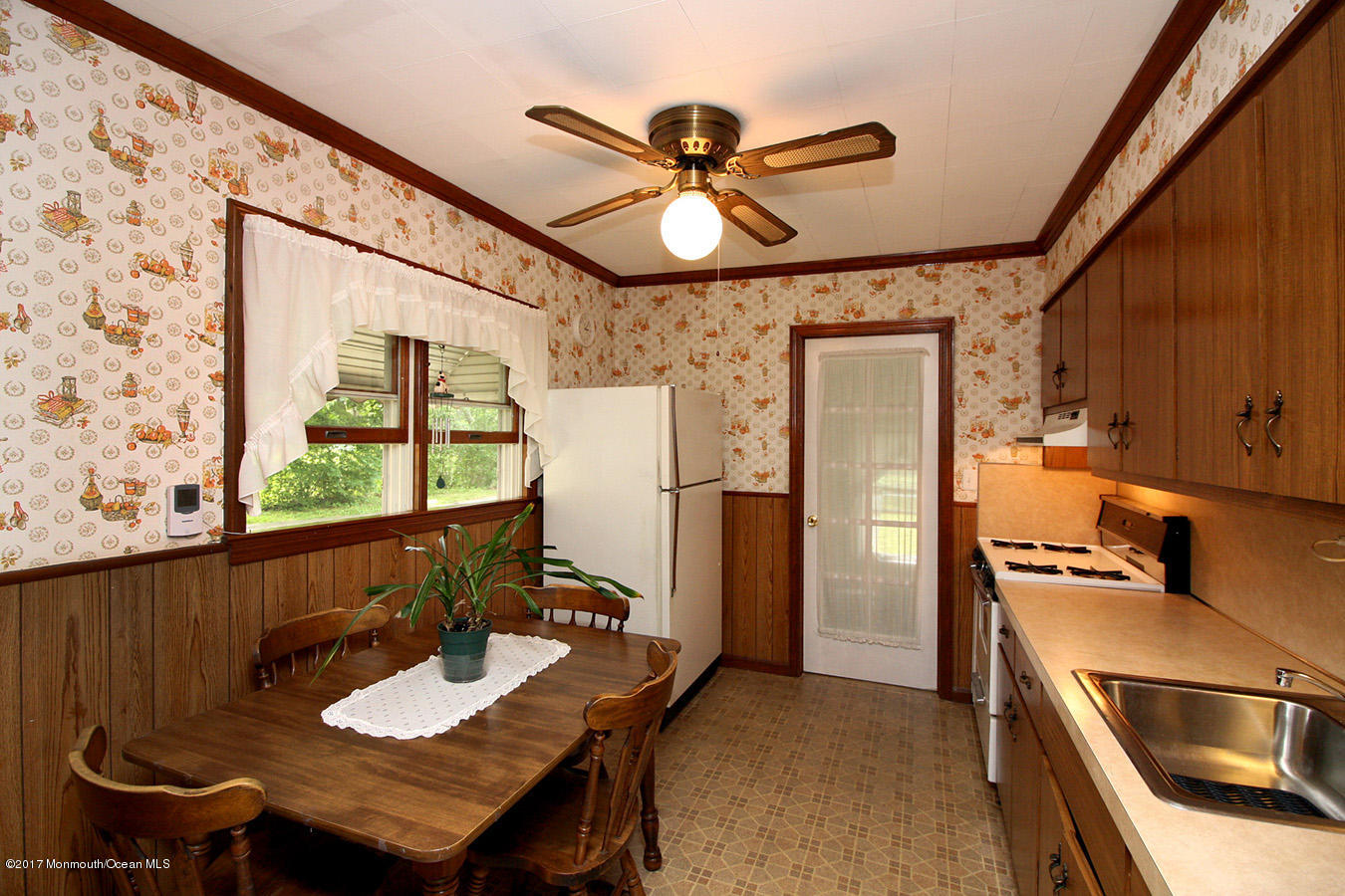 464 Georgia Tavern Road Howell, NJ 07731 - Photo 2 of 17 a view of a dining room with furniture window and wooden floor