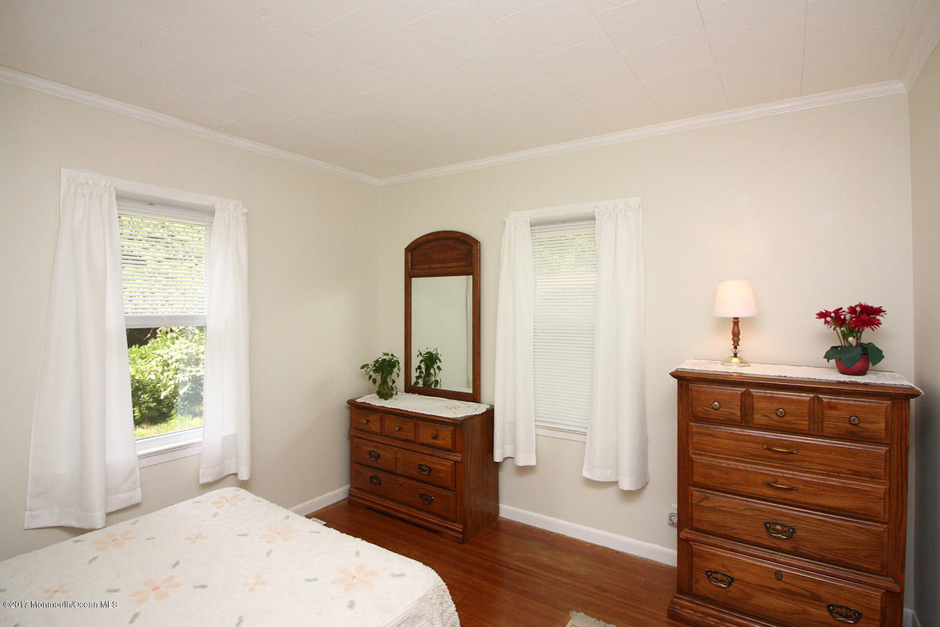 464 Georgia Tavern Road Howell, NJ 07731 - Photo 6 of 17 a bedroom with a bed and a dresser
