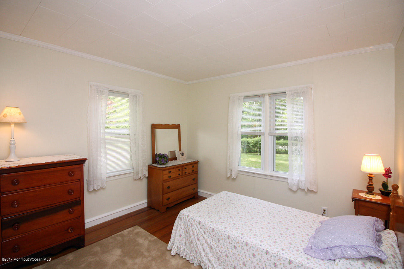 464 Georgia Tavern Road Howell, NJ 07731 - Photo 7 of 17 a bedroom with a bed and a window