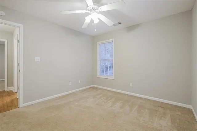 a bathroom with a sink toilet and mirror