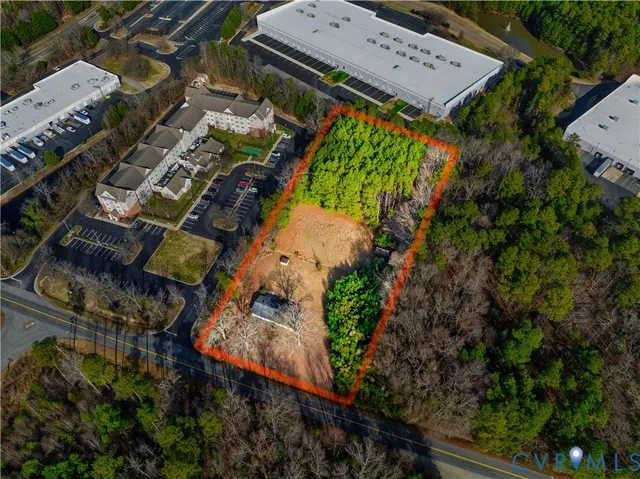 a view of fountain with tree in the background