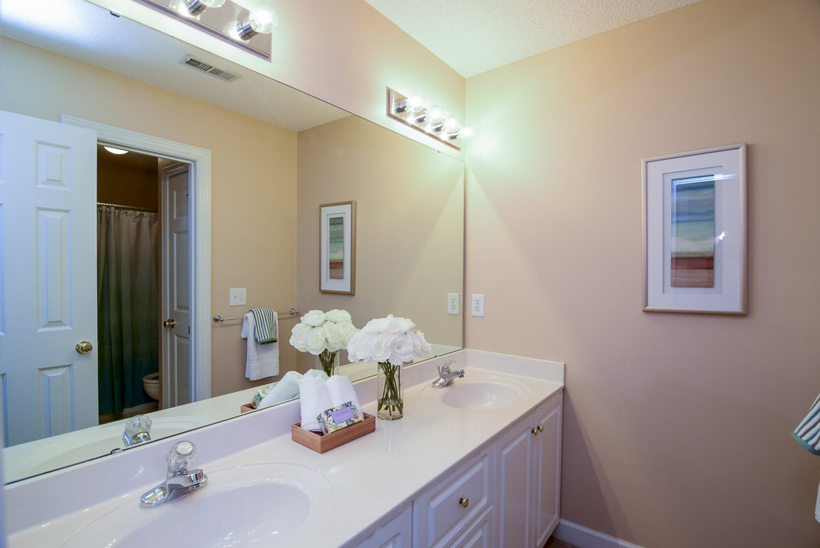 8808 Salute Street Raleigh, NC 27615 - Photo 18 of 25 Second guest bath has double vanity and was newly painted. Second guest Bath